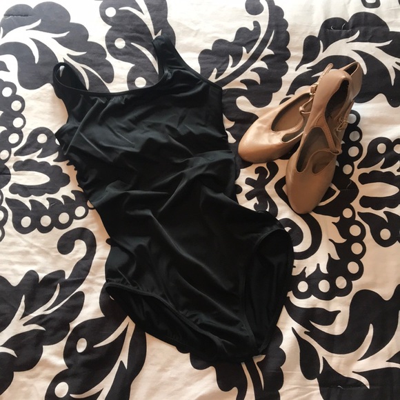 Like new black leotard with unique back